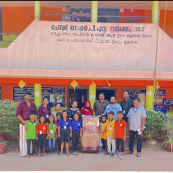 FL-09 ATTINGAL WAREHOUSE DONATING REFRIGERATOR TO GLPS CHEMBOOR