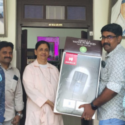 FL-09 KOLLAM DONATING WATER PURIFIER TO KARUNYATHEERAM ORPHANAGE